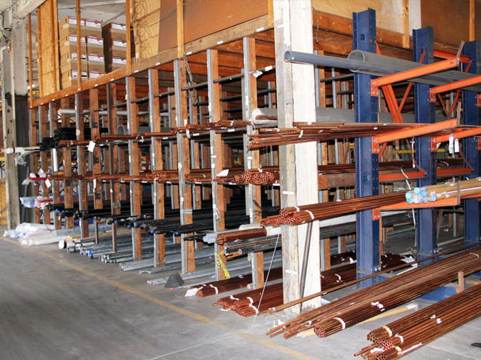 copper plumbing pipes on a rack in the Weinstein Willow Grove warehouse