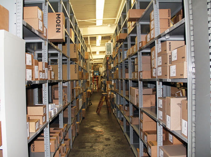 Warehouse shelves scotcked with plumbing spplies at Weinstein Supply Willow Grove PA