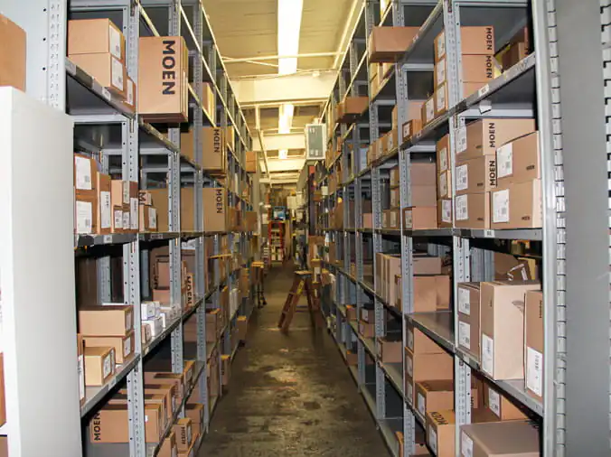 Warehouse shelves scotcked with plumbing spplies at Weinstein Supply Willow Grove PA