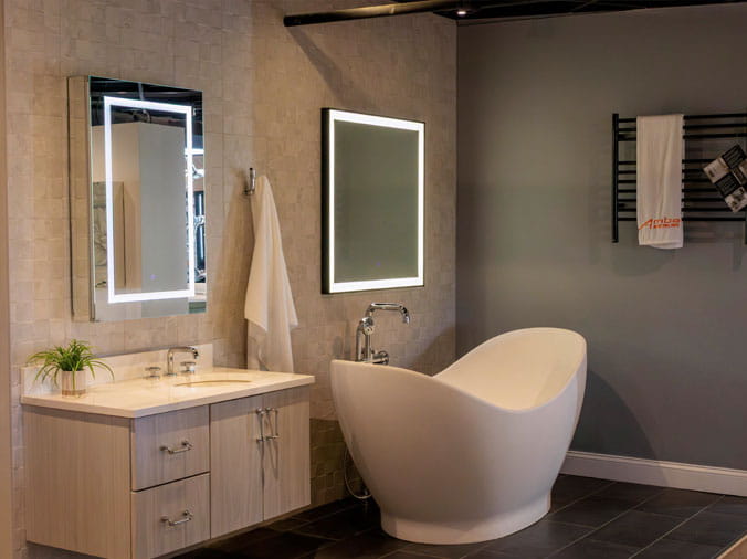 Sample bathroom with white free standing bath tub